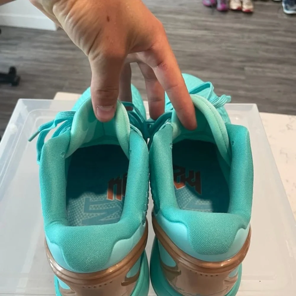 Nike Men’s Teal Basketball Sneakers with Metallic Copper Swoosh